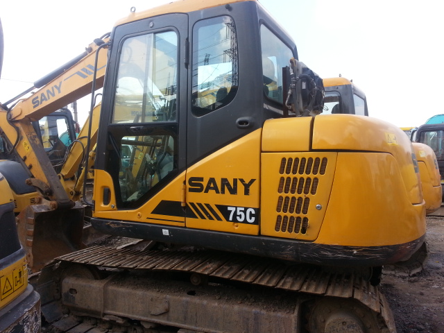 What are the benefits of buying a used Cat excavator from a certified dealer?